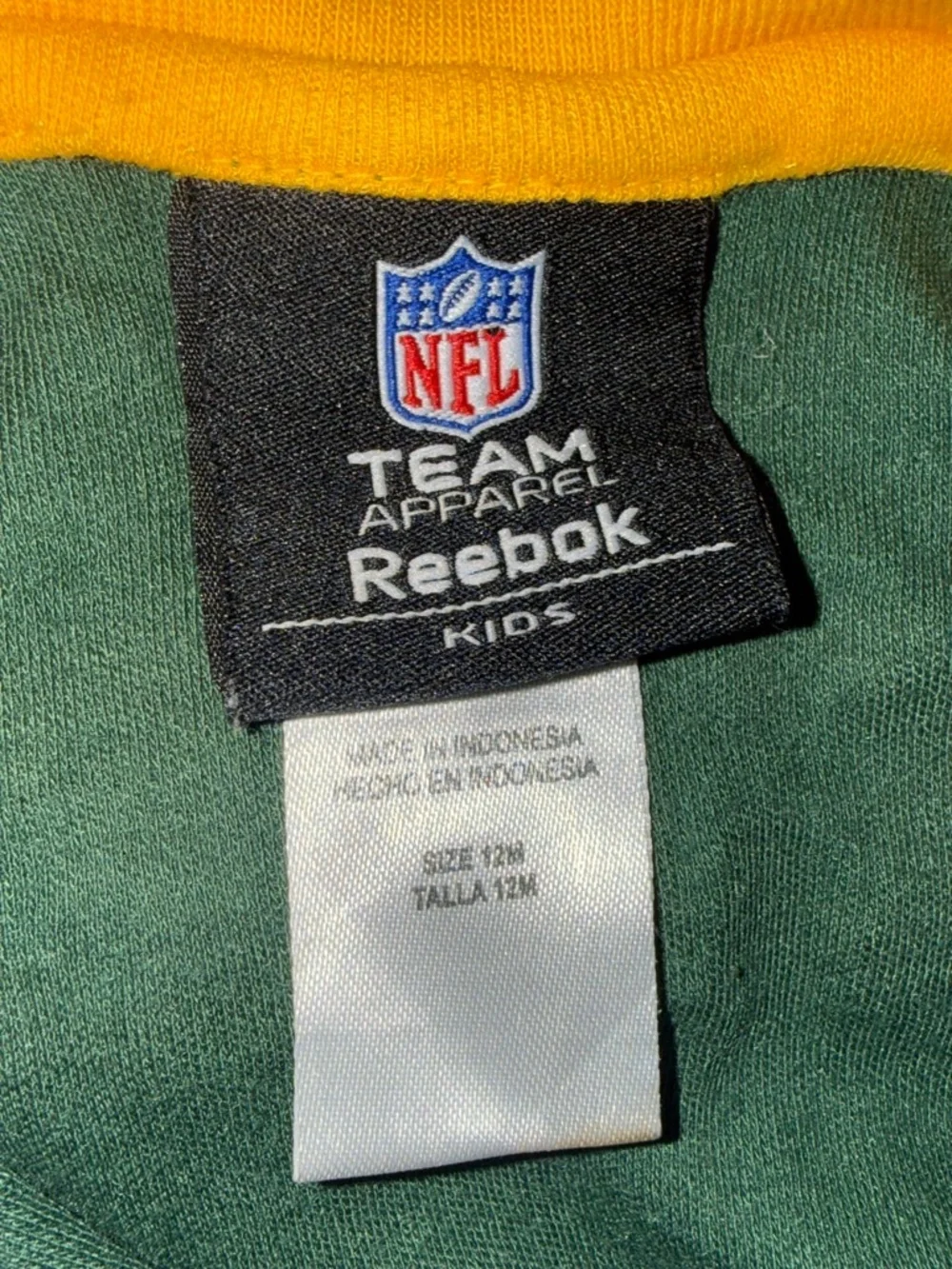 Green Bay Packers baby onesie with green/yellow accents